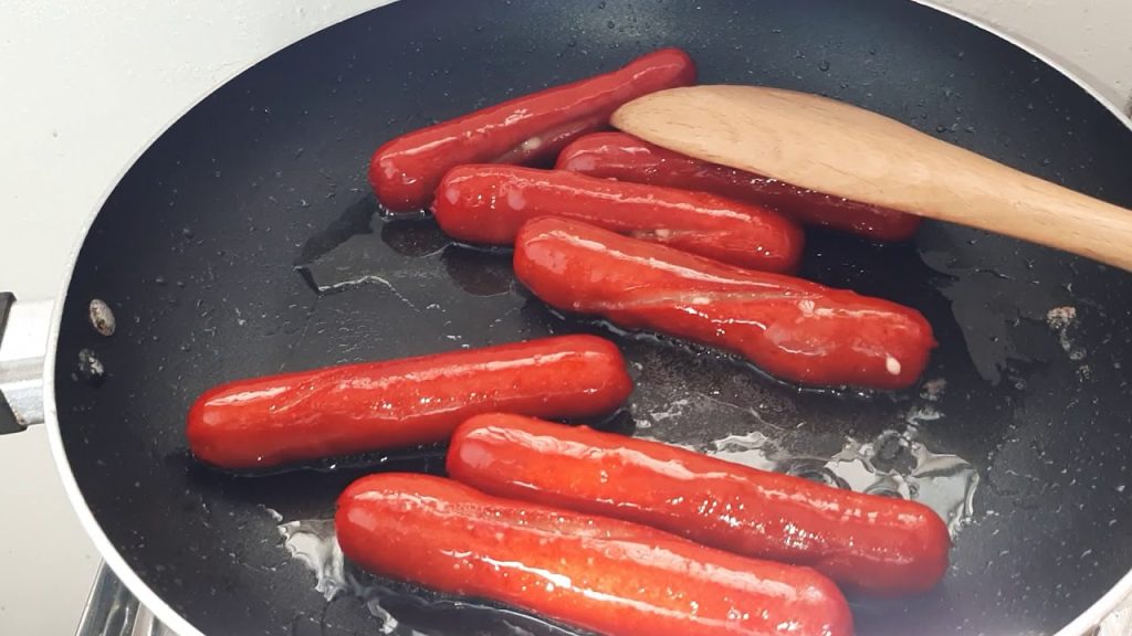 cook hotdogs on stove