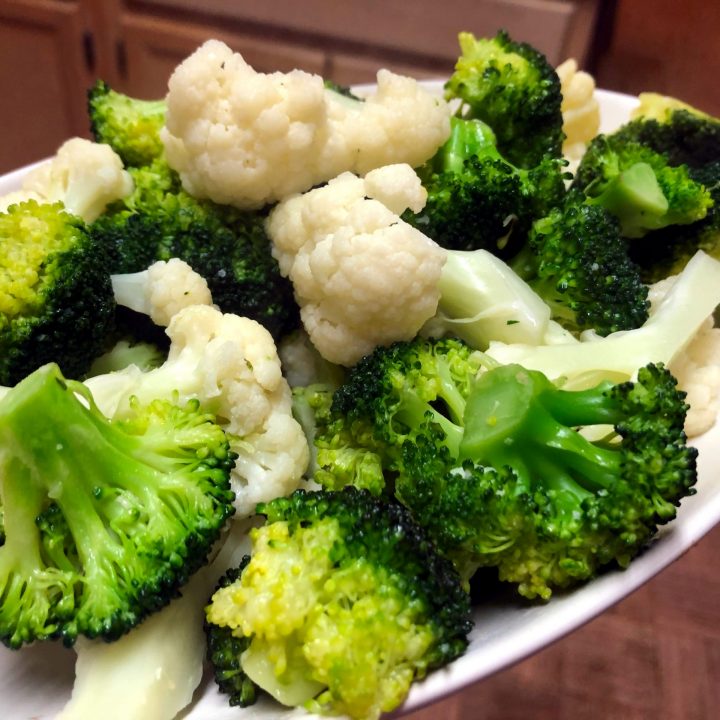  broccoli and cauliflower on  the stove